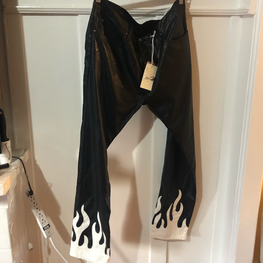 NWT MNML black + white flame polyurethane pants. Size 38.